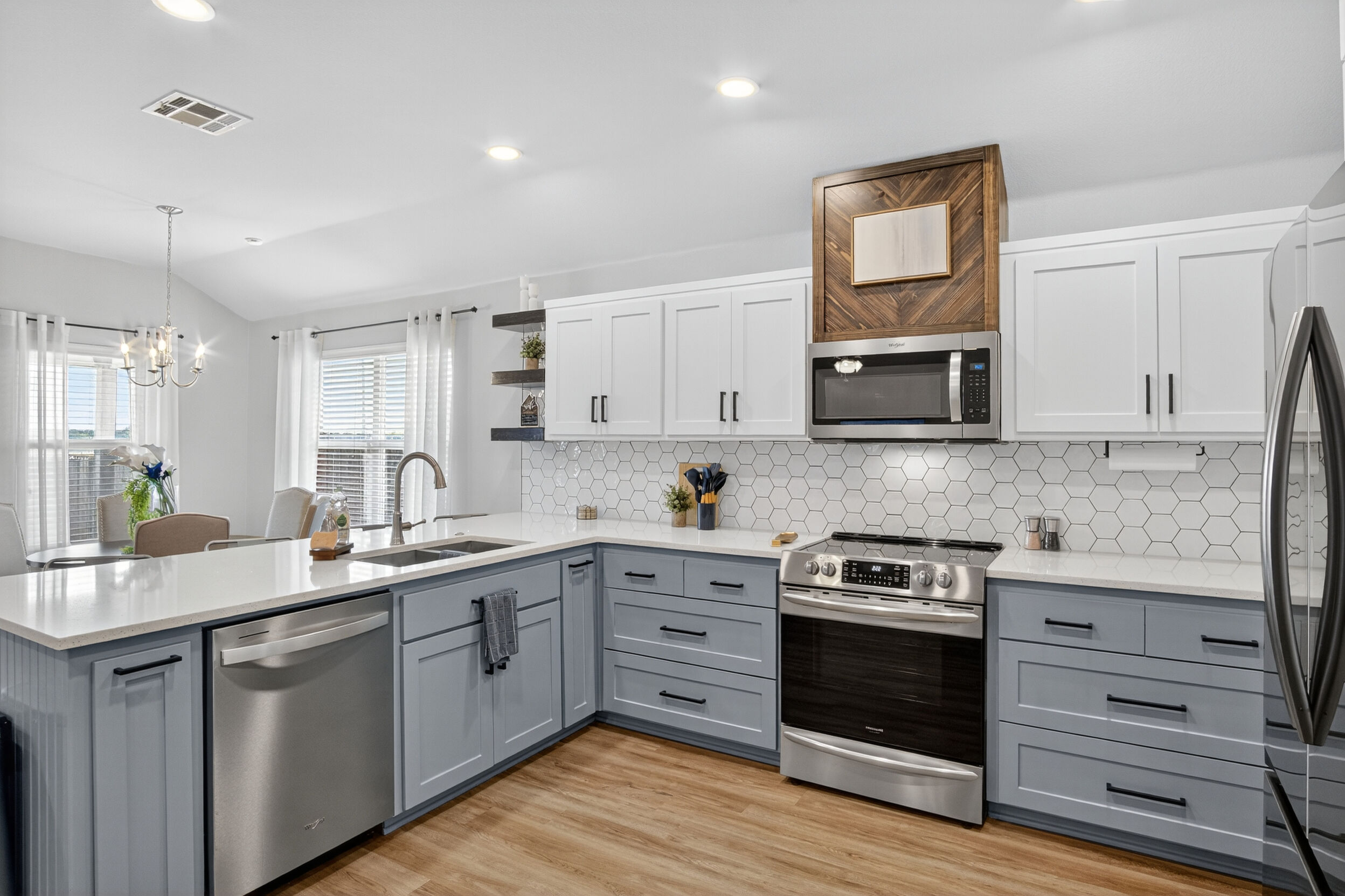 Kitchen island with range and dishwasher
