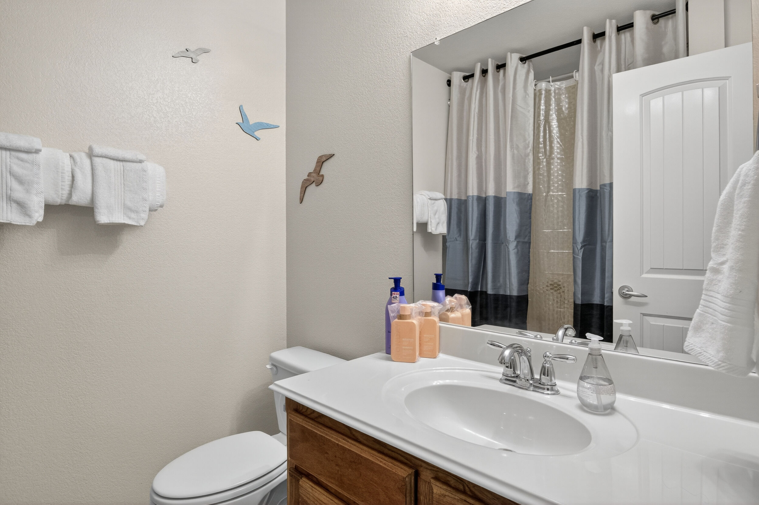 Bathroom vanity with mirror and storage