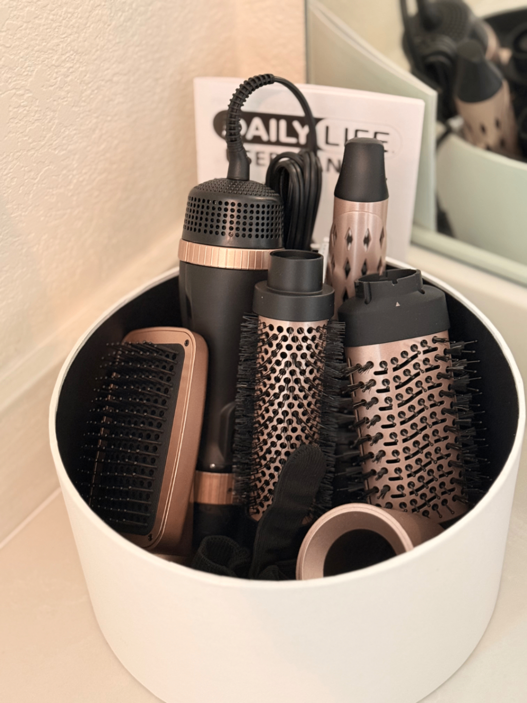 Bathroom caddy stocked with hair styling tools