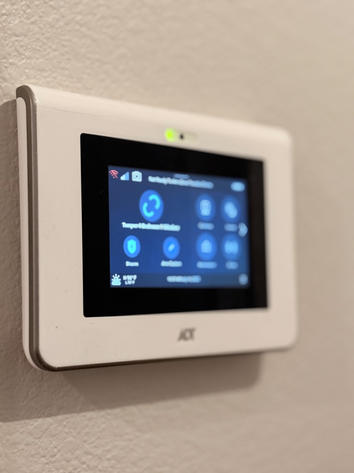 Smart home thermostat mounted on the wall